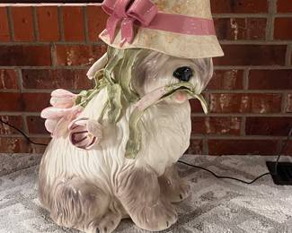 Decorative Ceramic Dog Figure with Pink Hat and Floral Accents