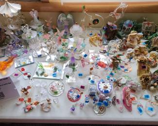 Crystal figurines and blown glass figurines and More.