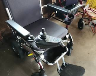 Jazzy Motorized scooter, barely used with new battery.
