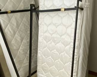 2 Twin CLEAN Mattresses and Box Springs, plus frames.
