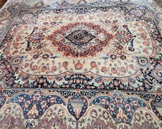 Huge Persian rug signed.