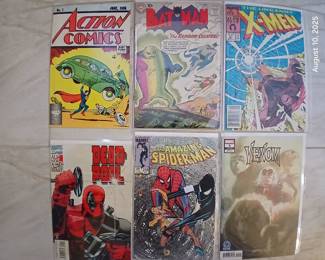 First issue deadpool , Venom variant , 10 cent batman comic , xmen , and action comics 1 from 88