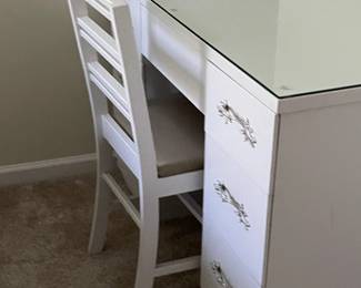 Bedroom set includes multiple coordinating pieces, all sold together for $400. Features clean lines and a with a white finish and glass top accents, perfect for creating a bright and airy look for a little girls room. Please note: while individual photos will be shown, all items are sold together as a complete set.