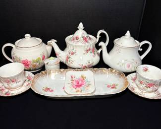 Floral Teapots And Tea Cups