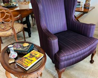 Pearson Wingback Chair. Plum Pinstripe Upholstery, Carved Cabriole Legs with Claw Feet.  Small Carved Wooden Parlor Table with Cabriole Legs and Carved Skirt Detailing. 