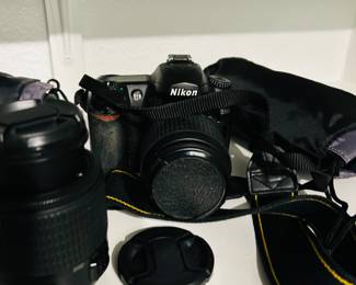 Nikon D3500 with 3 lenses.