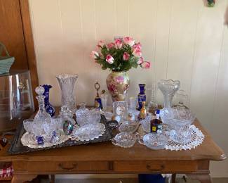 Library Table, crystal and pressed glass, cobalt vases and bells