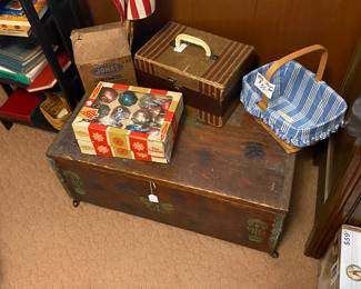 Old wooden trunk, xmas ornaments, old train suitcase, longaberger basket 