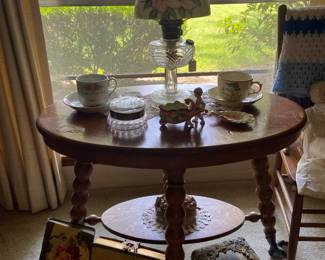 Oval Ball and Claw Table, Old photo albums, old Kerosene Lamp 