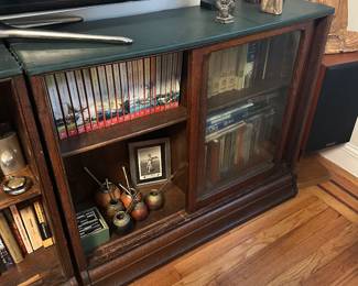 Book shelving have sliding doors 