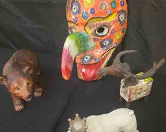 Whimsical mask, signed art piece, carved wooden bear, and a bulldog crowned as King :-)