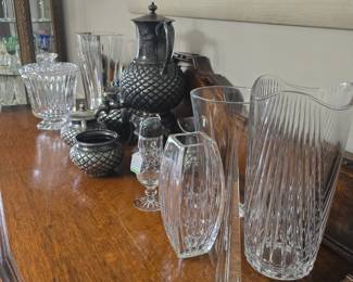 On top of the buffet, you'll find eye-catching crystal with names like Baccarat and Waterford, plus an antique coffee serving set from the mid 1800s by Meriden Britannia Company