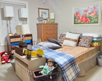 full-sized mattress and box spring with bed frame, lamps, and many other items