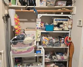 Brother sewing machine, irons, sewing supplies, scissors, thread, etc. Everything to do with sewing!