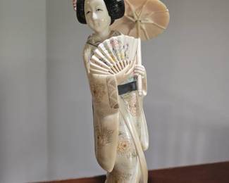 Antique Asian lady with beautiful detail