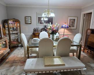 Brass & Glass dining table with 6 upholstered chairs, leather bench, antique display cabinets, antique furniture and so much more!