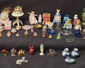 Group of a few of our miniatures. Pictured are a cat signed by Karen Phillips, ceramics hand-painted & signed by Marsha Hedrick, die-cast pieces, Birchcroft fine bone China piece, and many more collectibles.
