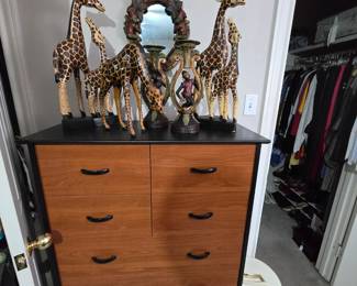 Dresser and safari figurines
