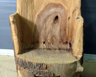 Hand-Carved Wood Log Chair With Face Detail