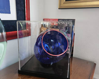 Item # 002 Dale Chihuly cobalt blue basket with cadmium red lip. Rare signed blown glass Basket in case. Price $5250.00