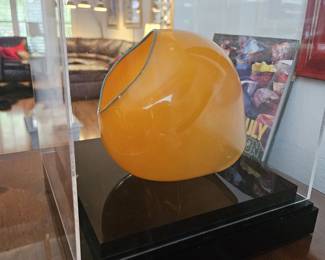 side view Item#003 "Very Rare" Dale Chihuly glass sculpture, mango basket with blue lip wrap. This spherical piece is signed and in a display case. $7200.00