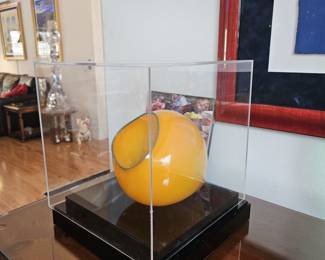 In case Item#003 "Very Rare" Dale Chihuly glass sculpture, mango basket with blue lip wrap. This spherical piece is signed and in a display case. $7200.00