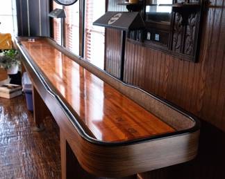 Shuffleboard table with over $1000 in accessories