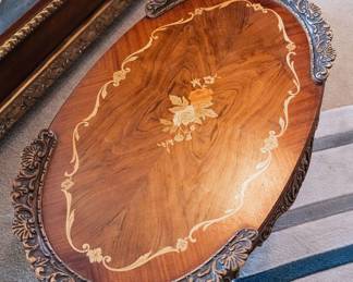 oval inlay table with floral detailing