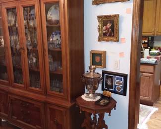 Works of art, china hutch filled with more collectibles