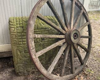 Carved stone monument——stela, huge antique wagon wheel