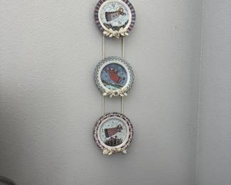 Antique white cast iron plate wall hanging (shows wear) and 4 folkart angel plates 