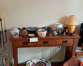 Mission table, iron candle stand, pottery