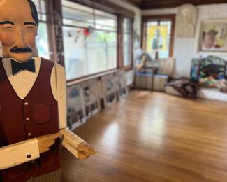 Besides our welcome gentleman..we have several vintage stain glass window hangings