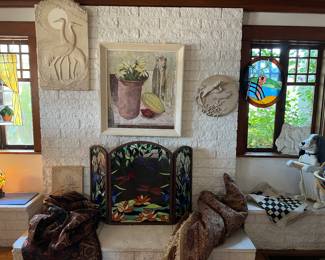 Vintage stain glass screen, hand carved beagle towel holder, sandstone wall sculptures (E. Engles),antique Karistan rug (72" x 98" ) and another antique rug (56" x 84").....Large painting by artist Jack Stangle 