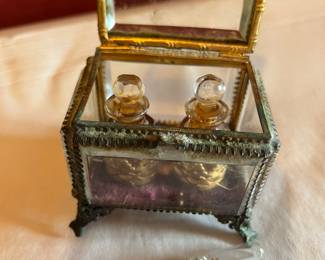Antique ornate brass box with two glass perfume bottles and a very rare vial perfume holder
