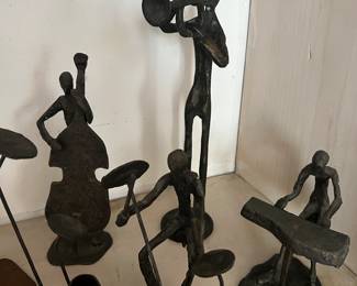 Iron  varies musician sculptures (horn, piano, drums, guitar