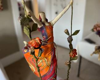 We have a very large collection of signed Sarena Mann paper mache Sculptures.....this is just a sample of one of her sculptures...