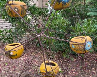 old mexican pots on metal stand