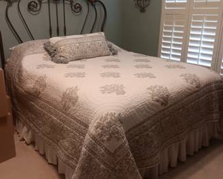 Queen size metal headboard and Ethan Allen shabby chic quilt are for sale. Mattress set is not for sale.