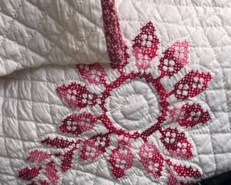 Hand-cross-stitched quilt