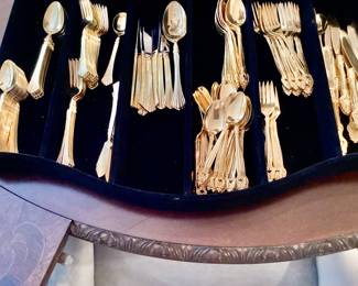 (2) sets of gold flatwareTools of the Trade and Cornet
