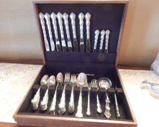 Sterling flatware in case. Service for eight