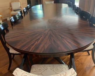 Dining table composed of two circular tables with center insert (as shown). Can also be used as two separate circular tables seating 8 each.