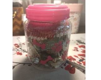 plastic container filled with misc jewelry asking $40