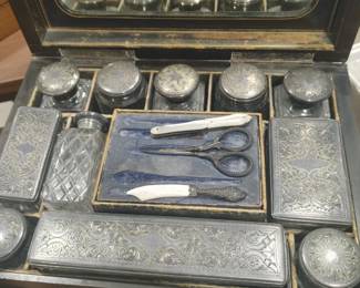 vintage antique  victorian vanity case, sterling silver pieces and plated, secret compartments, front bottom where front plate fits needs some work. asking $450