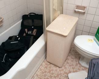 We have two nice vintage hampers