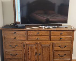 Matches bedroom set. Large screen TV