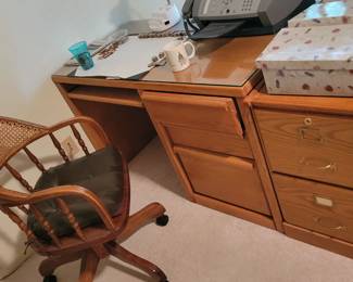 Second desk. Desk chair. Some office supplies.