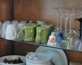 Set of dishes. Cup and saucer collection. Glassware.