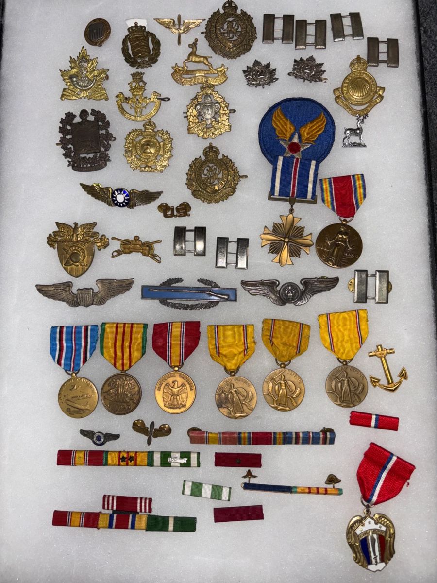 Medals, insignias, British cap badges, wings, shooting awards, ribbons and more